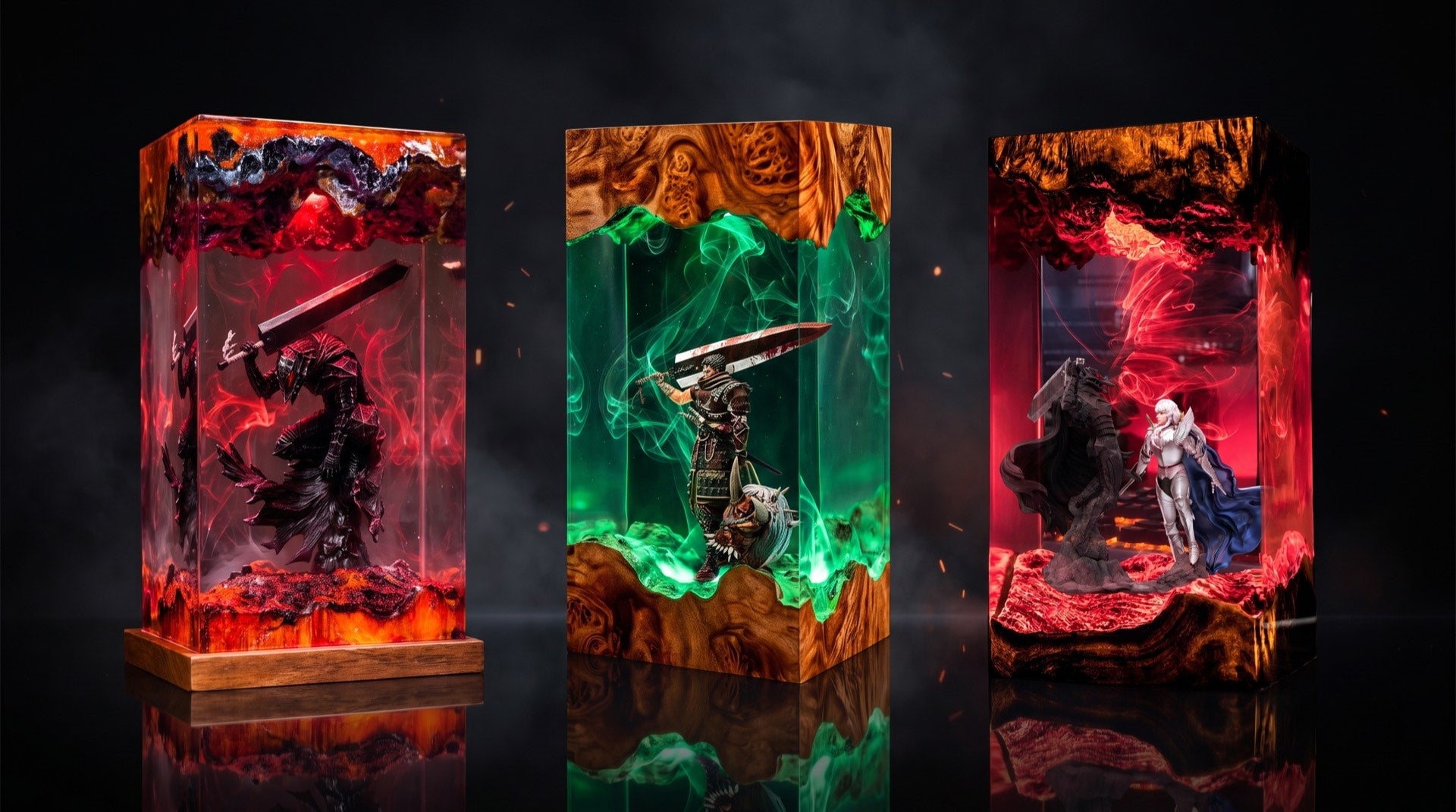 The three Berserk resin lamps glowing in the dark